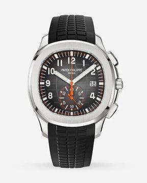 The Relógio Patek Aquanaut is a luxury wristwatch featuring a black textured strap, black dial with white numerals, orange accents, silver casing, date display, and an elegant sub-dial marked in orange and white—perfect as an relógio executivo.
